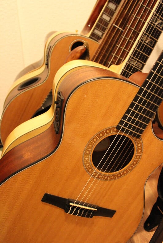 Many Acoustic Guitars.